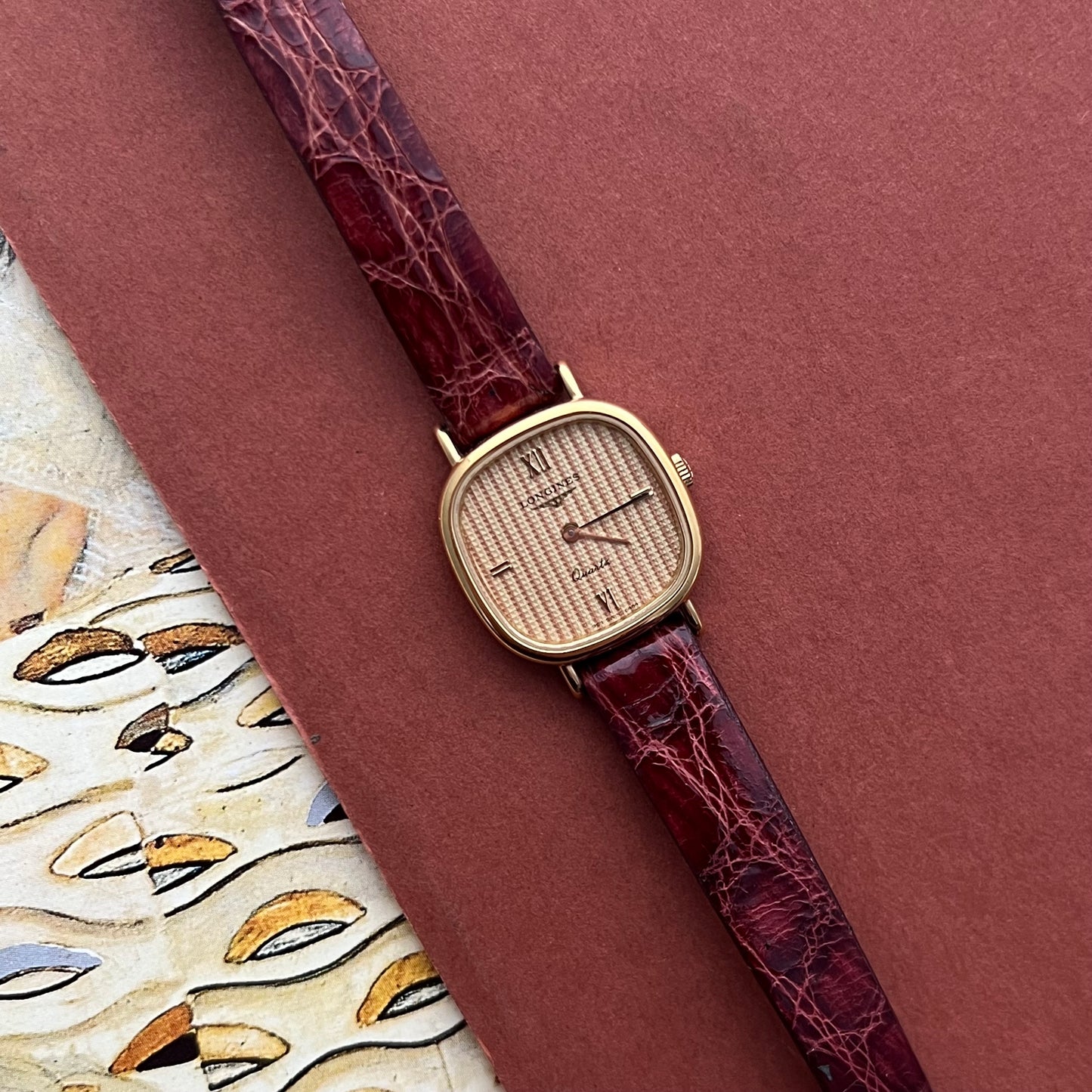 Longines Wafer Textured Dial Burgundy Strap Women’s Watch