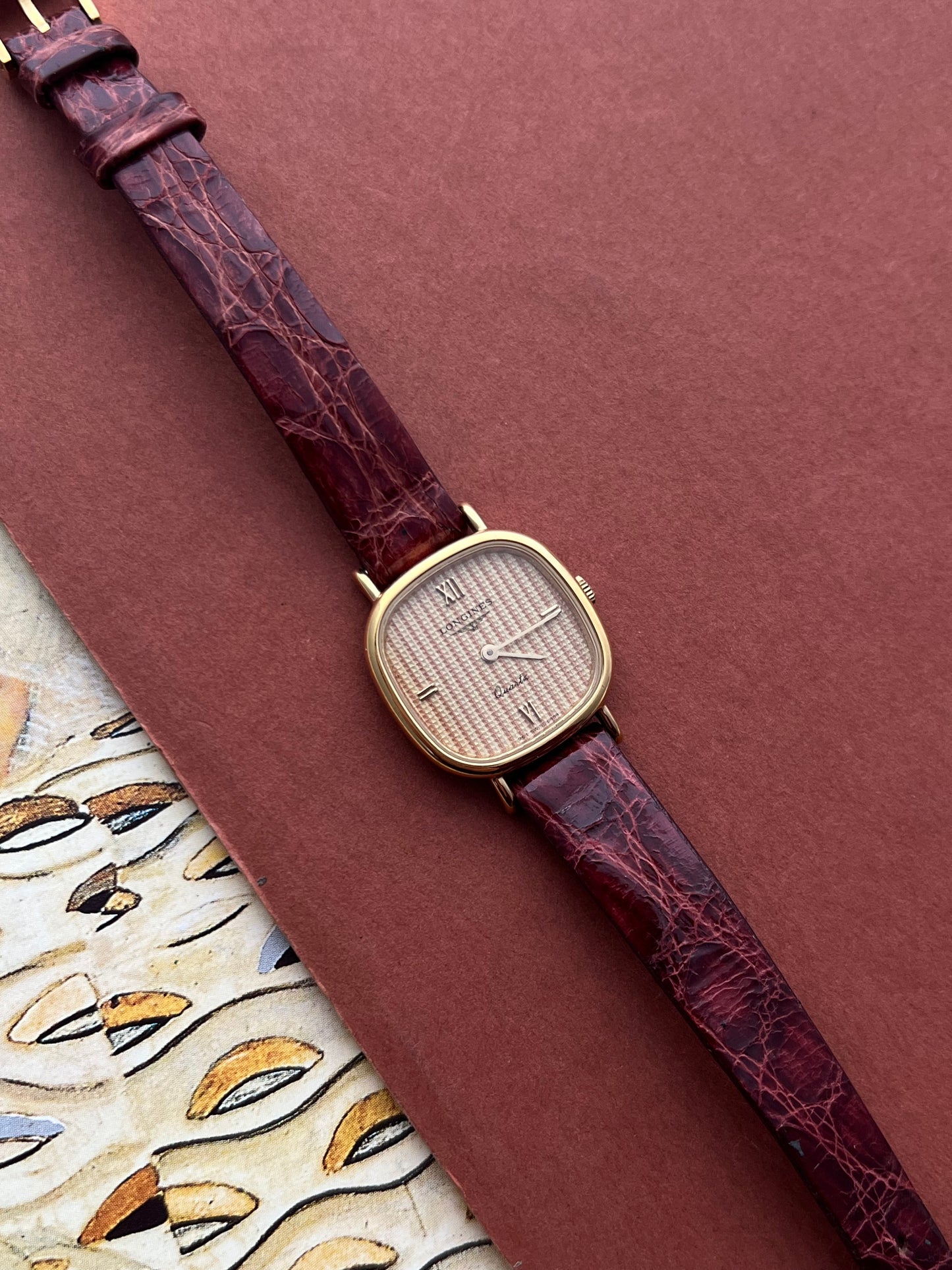 Longines Wafer Textured Dial Burgundy Strap Women’s Watch