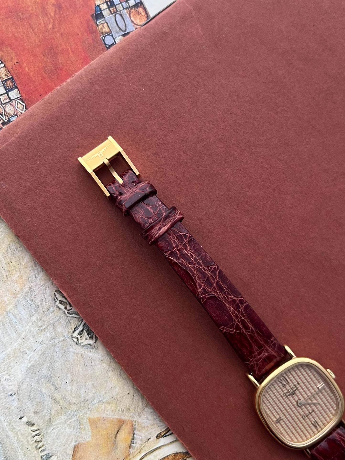 Longines Wafer Textured Dial Burgundy Strap Women’s Watch