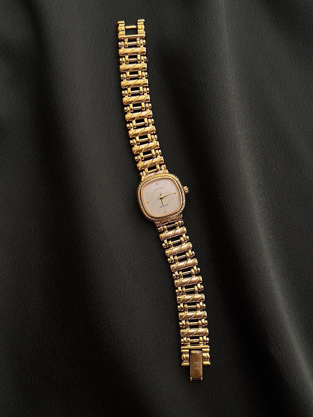 Tissot Ladies Gold Watch with Textured Bracelet and Striped Dial