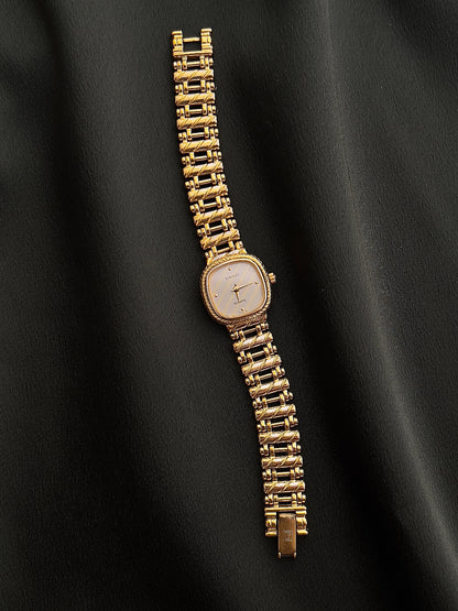 Tissot Ladies Gold Watch with Textured Bracelet and Striped Dial