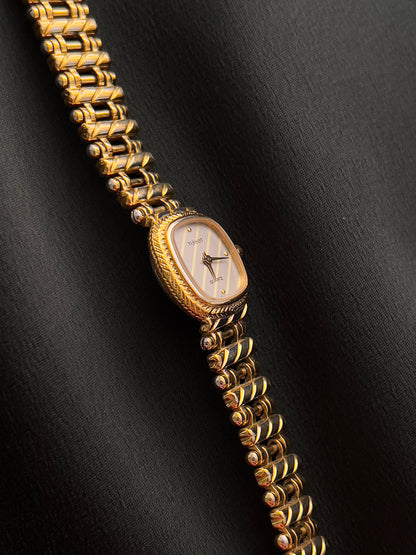 Tissot Ladies Gold Watch with Textured Bracelet and Striped Dial