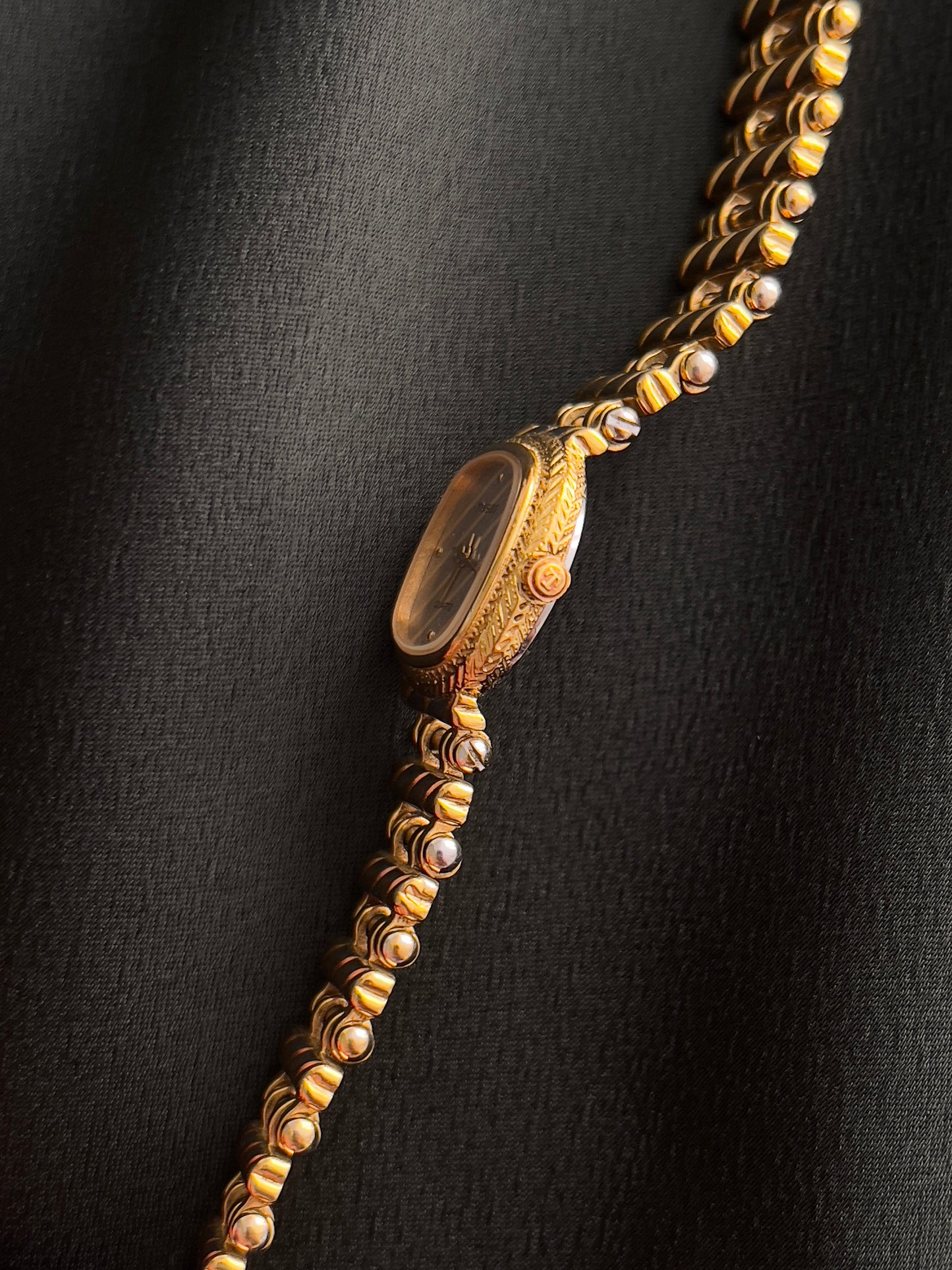 Tissot Ladies Gold Watch with Textured Bracelet and Striped Dial