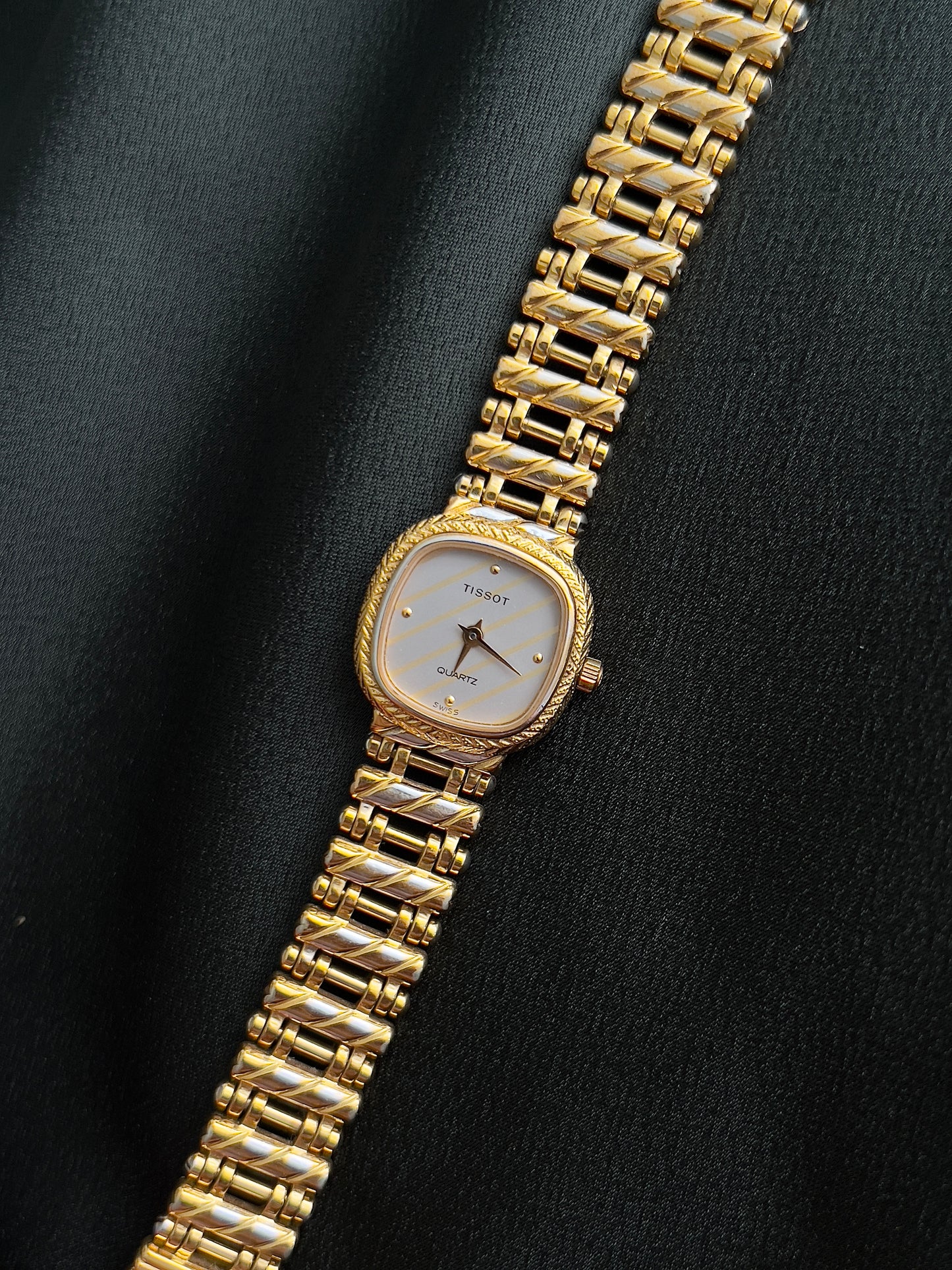 Tissot Ladies Gold Watch with Textured Bracelet and Striped Dial