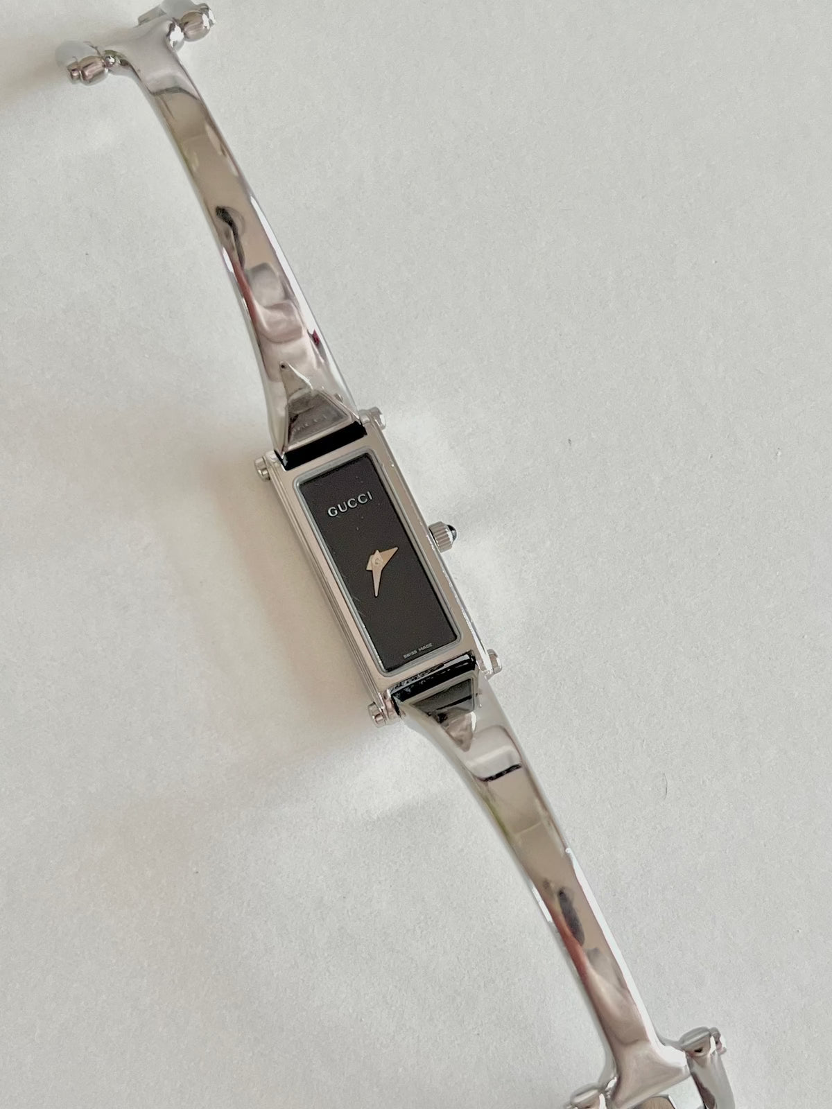 Gucci 1500L Silver Bangle Women's Watch Black Dial, box set of a vintage women's watch at Gilded Hour.