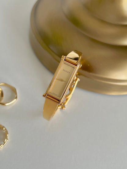 Gucci 1500 Gold Bangle Women’s Watch Champagne Dial