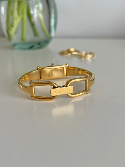 Gucci 1500 Gold Bangle Women’s Watch Champagne Dial