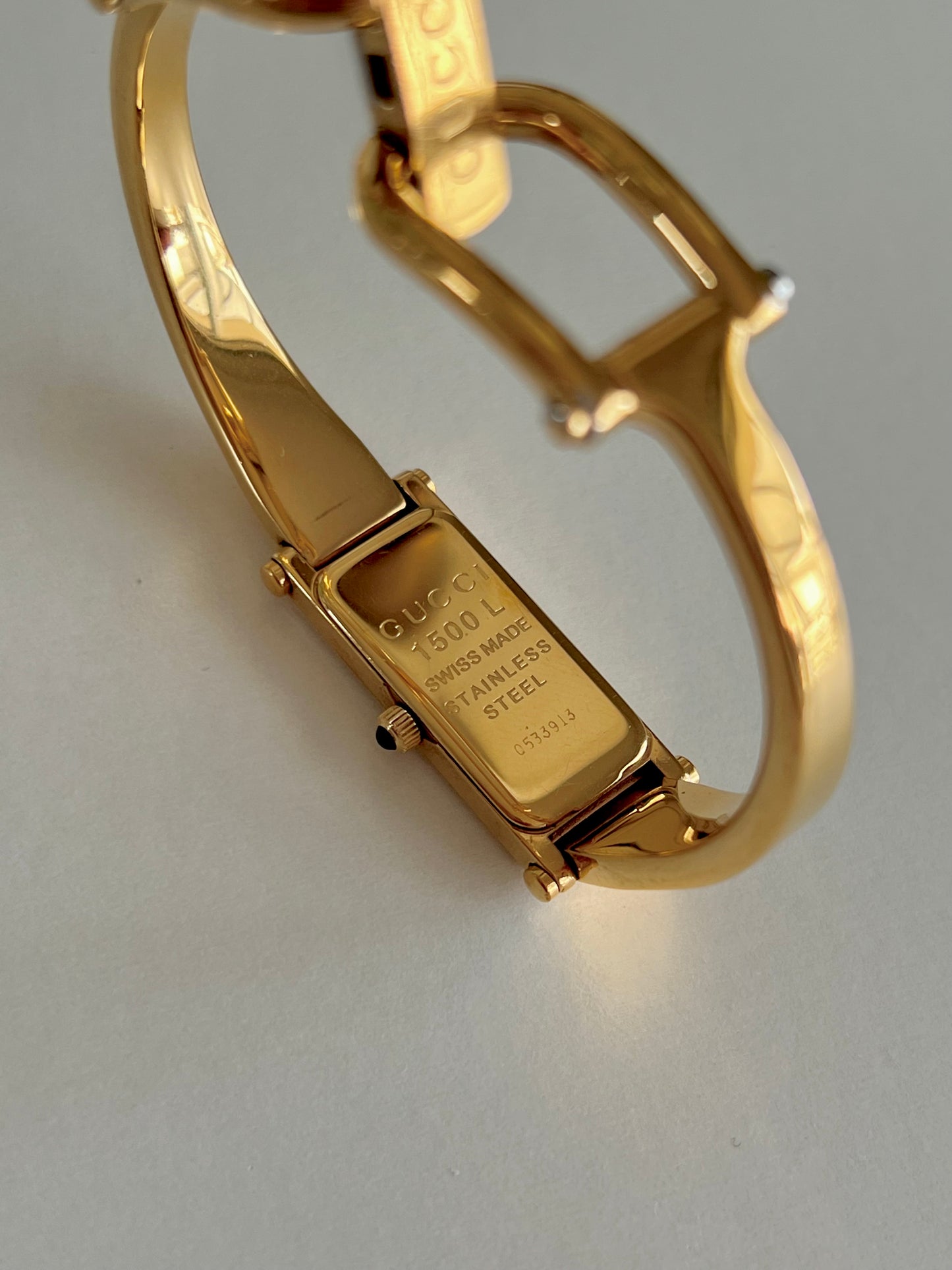 Gucci 1500 Gold Bangle Women’s Watch Champagne Dial