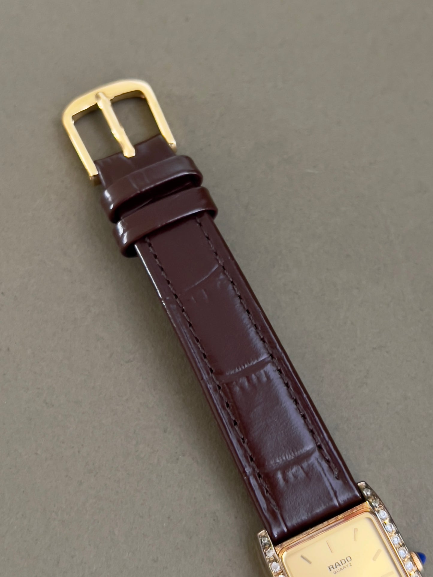 Rado Tank Gold Toned Woman's Watch with Inlaid Diamonds