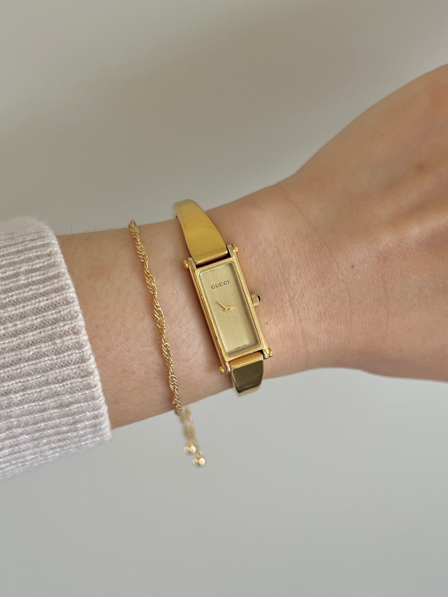 Gucci 1500 Gold Bangle Women’s Watch Champagne Dial