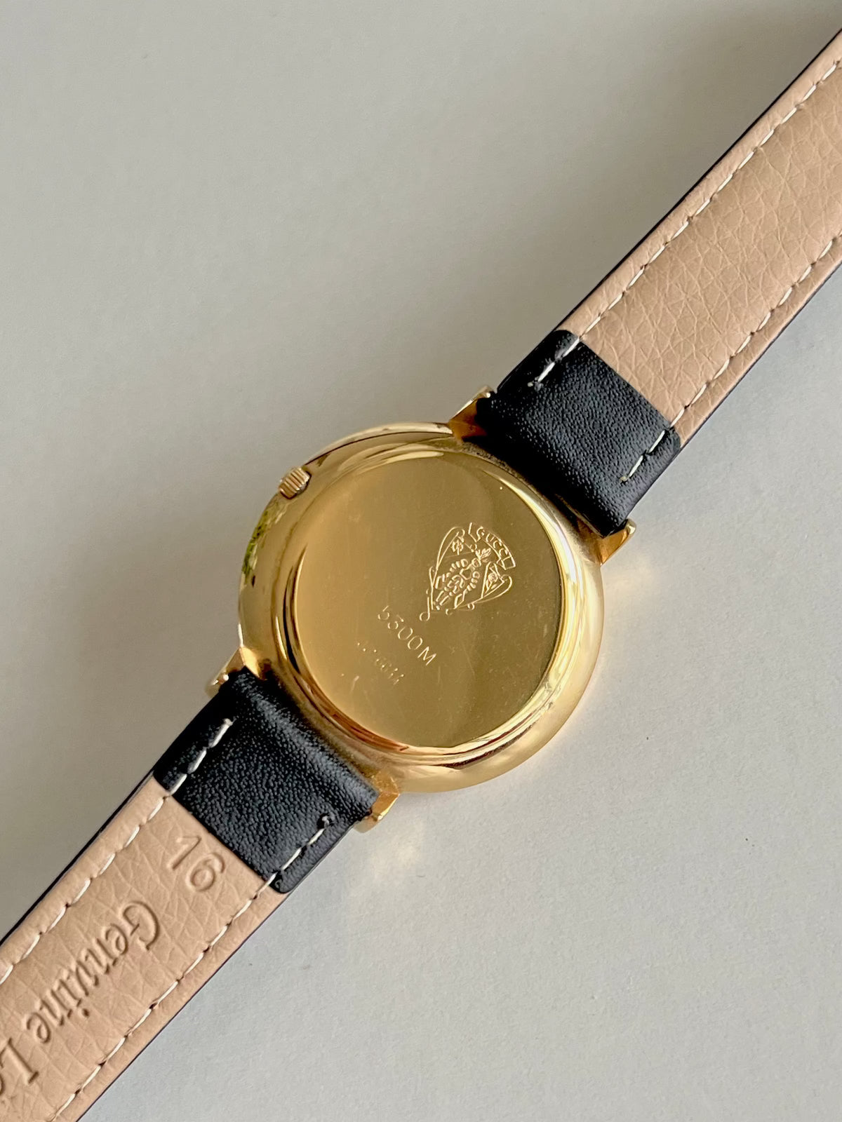 Gucci 5300M Gold Unisex Watch Mother of Pearl Dial, caseback detail of a vintage women's watch at Gilded Hour.