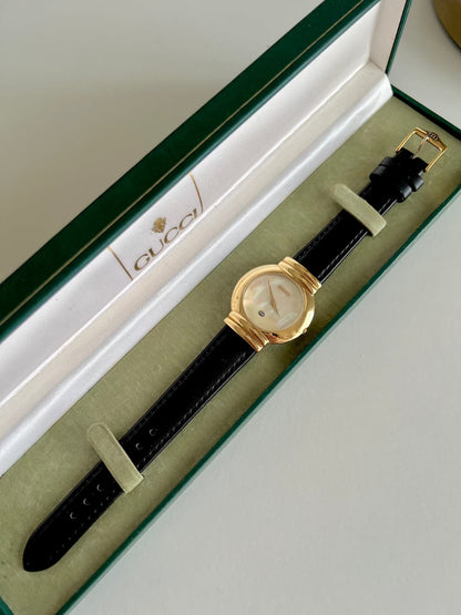 Gucci 5300M Gold Unisex Watch Mother of Pearl Dial, dial close up of a vintage women's watch at Gilded Hour.