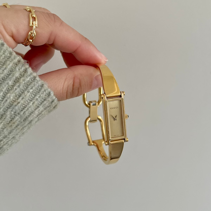 Gucci 1500 Gold Bangle Women’s Watch Champagne Dial