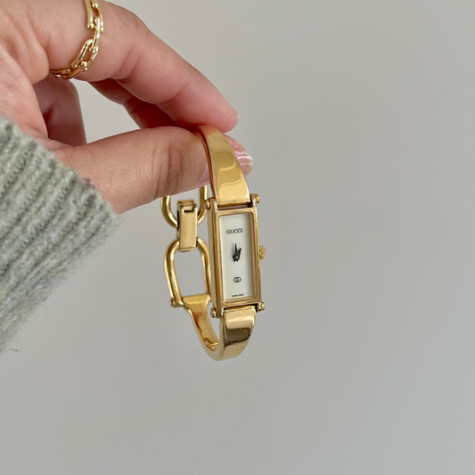 Gucci 1500 Gold Bangle Women’s Watch Ivory Dial