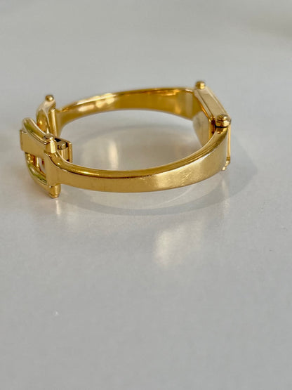 Gucci 1500 Gold Bangle Women’s Watch Ivory Dial, bracelet detail of a vintage women's watch at Gilded Hour.