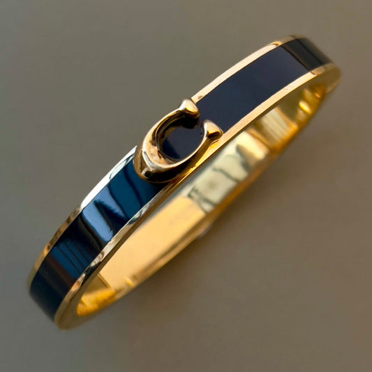 Coach Black Bangle with a "C" Logo