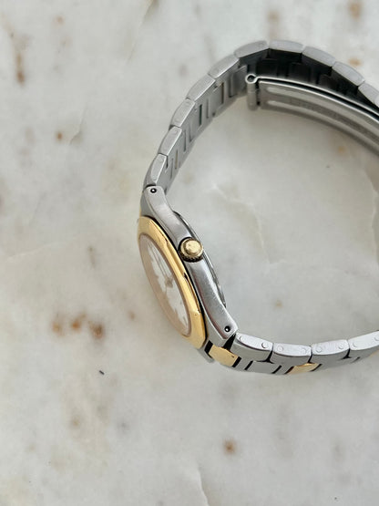 Tissot P440 White Roman Date Two Tone Watch: case and integrated link profile.