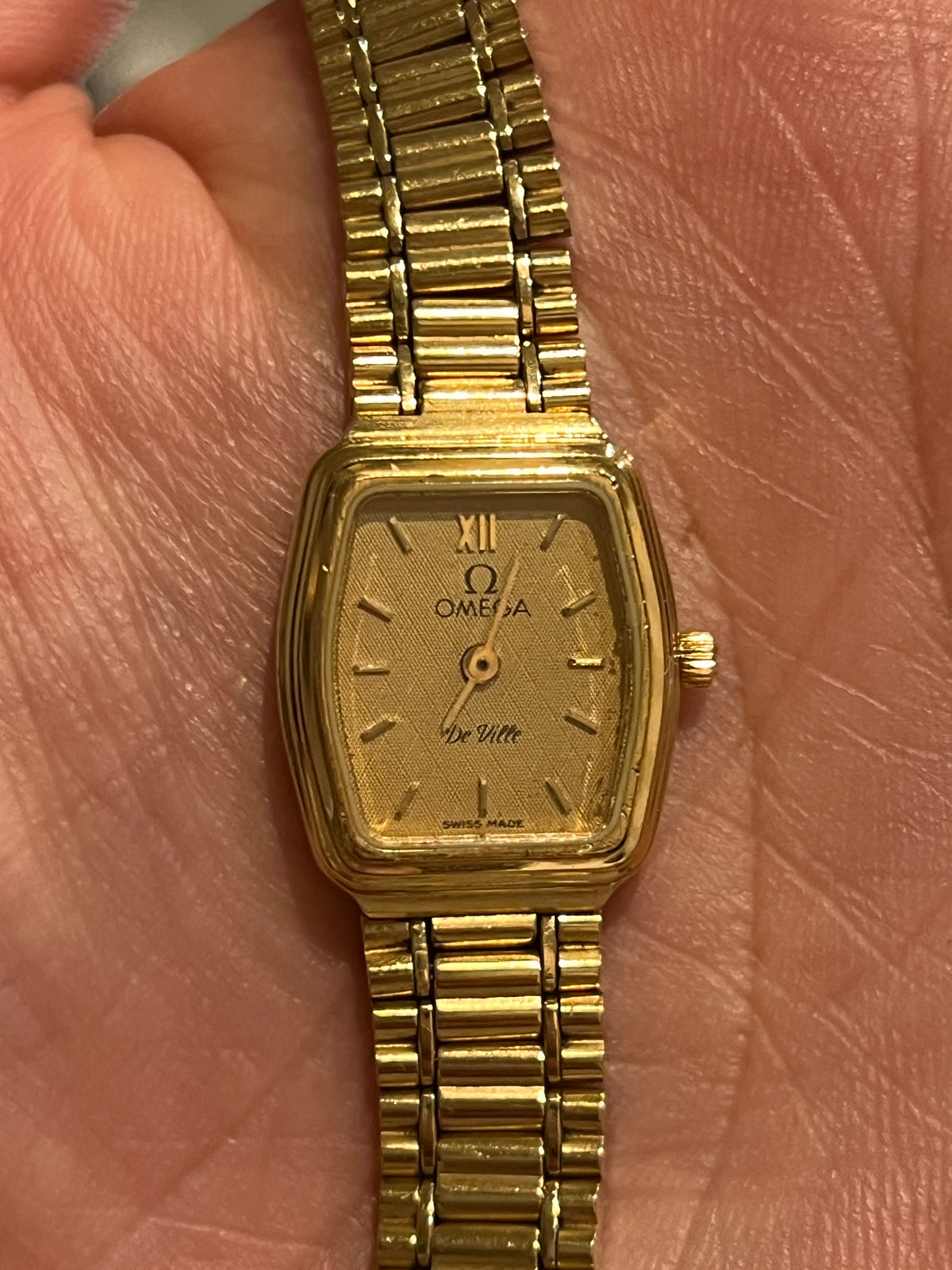 Omega De Ville Gold Bracelet Women’s Cocktail Watch with Textured Dial, front view of a vintage women's watch at Gilded Hour.