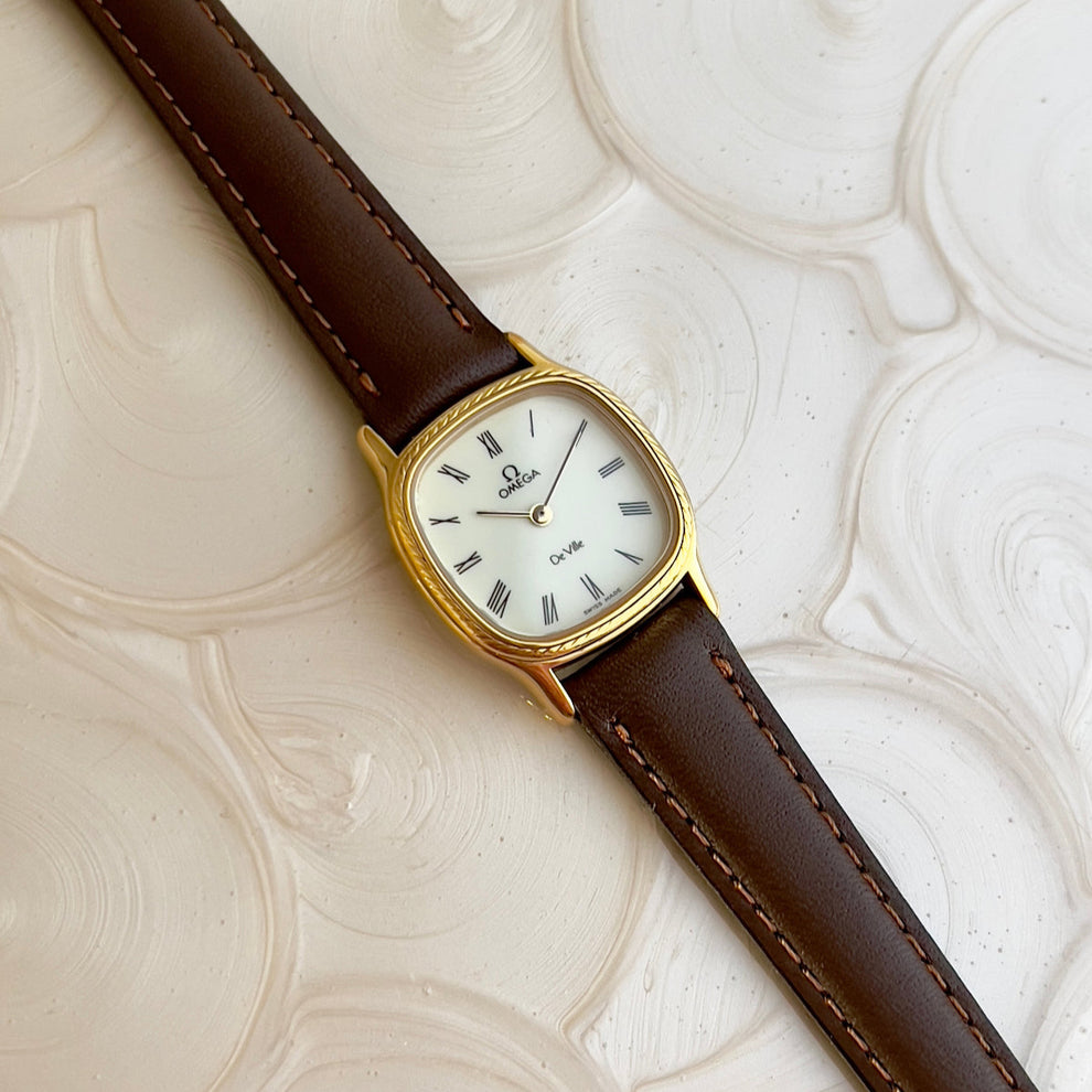 Omega De Ville cushion case watch with rope bezel pattern