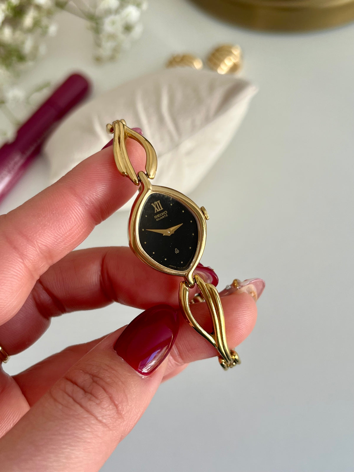 Seiko Black Dial Leaf Bracelet Women’s Watch, caseback detail of a vintage women's watch at Gilded Hour.