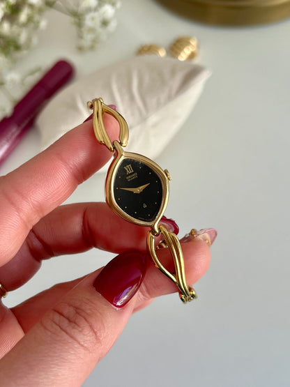 Seiko Black Dial Leaf Bracelet Women’s Watch, caseback detail of a vintage women's watch at Gilded Hour.