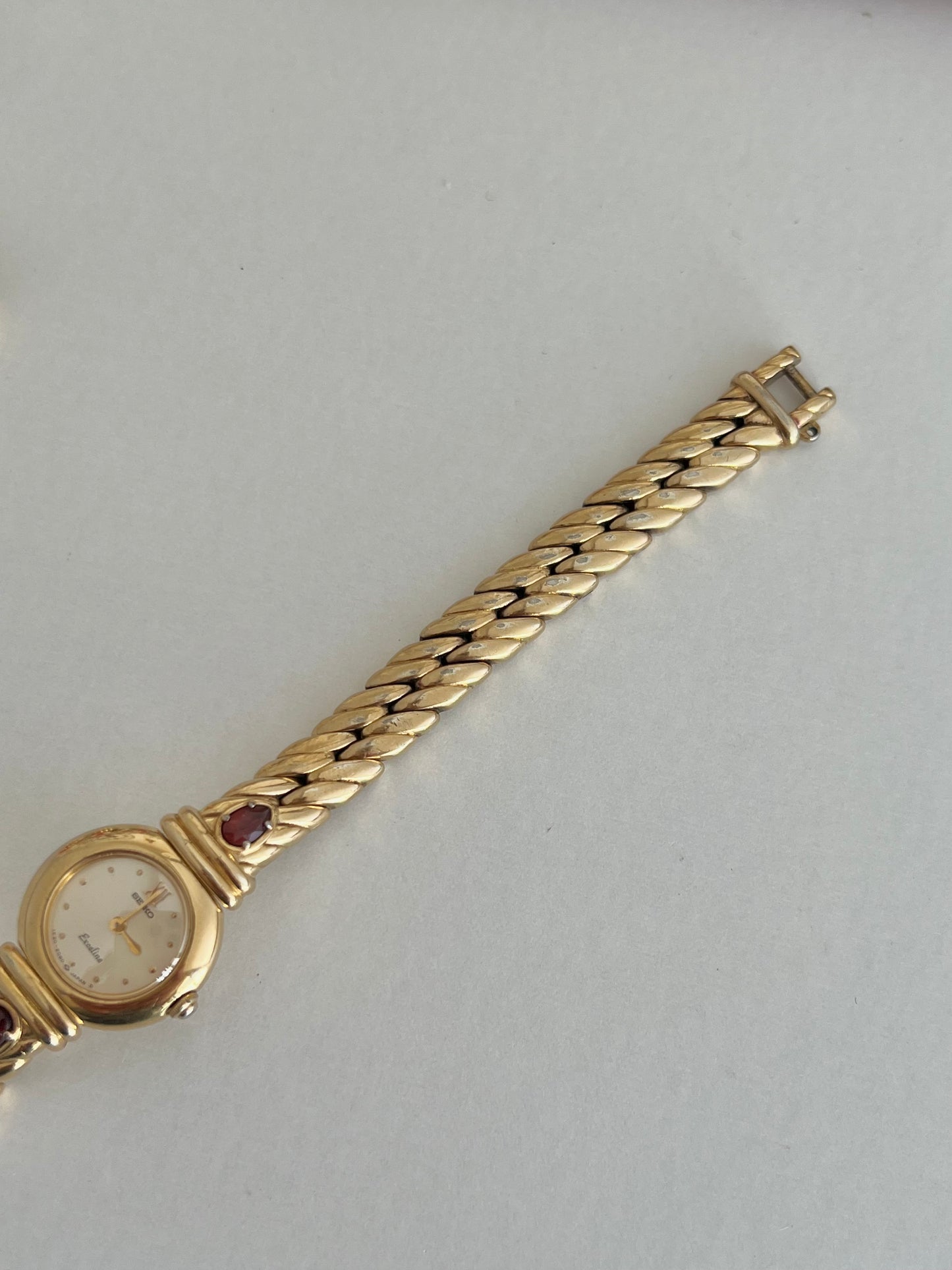 Seiko Exceline Gold Tone Red Accent Women's Watch