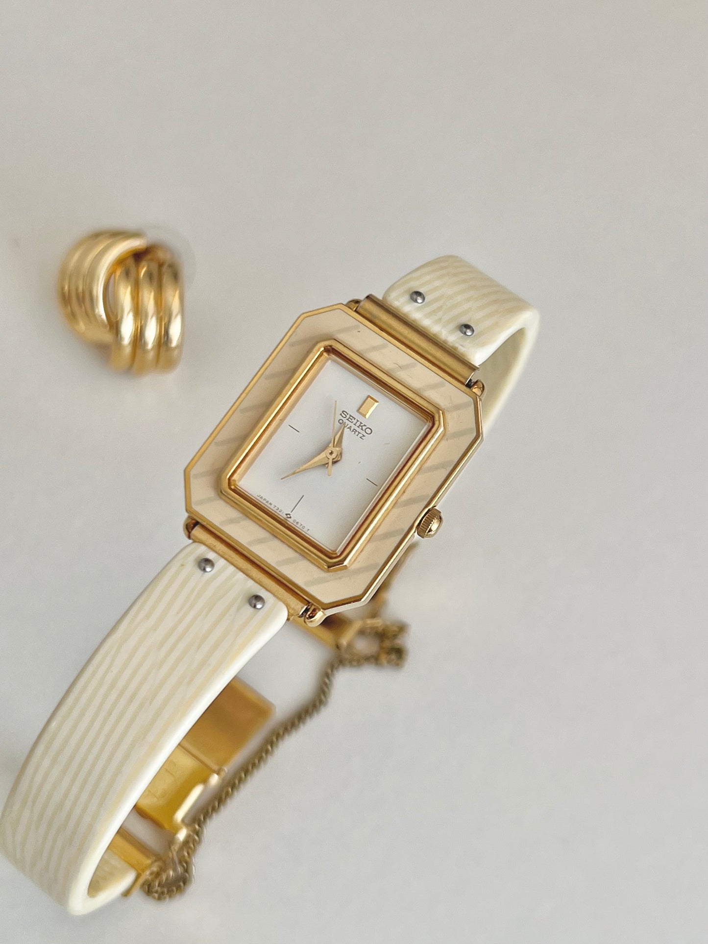 Seiko Rectangular Golden Bangle Women's Watch with Enamel Bezel