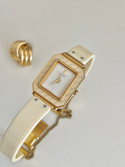 Seiko Rectangular Golden Bangle Women's Watch with Enamel Bezel