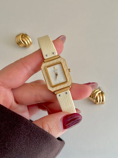 Seiko Rectangular Golden Bangle Women's Watch with Enamel Bezel