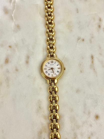 Seiko Belfina Gold Toned Round Woman's Watch