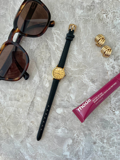 Omega De Ville Gold Tone Round Champagne Dial Women's Watch