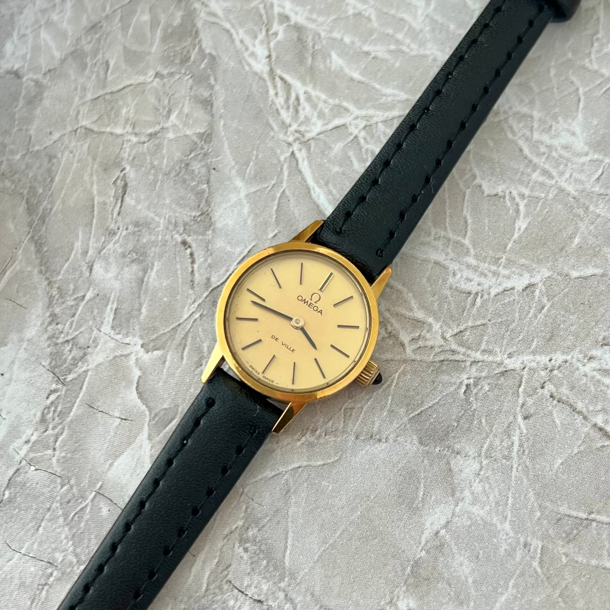 Omega De Ville Gold Tone Round Champagne Dial Women's Watch