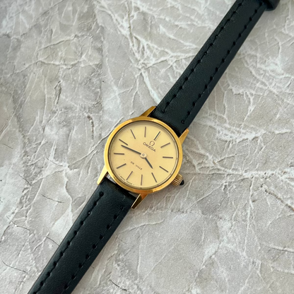 Omega De Ville Gold Tone Round Champagne Dial Women's Watch