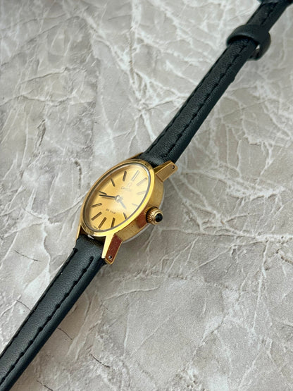 Omega De Ville Gold Tone Round Champagne Dial Women's Watch