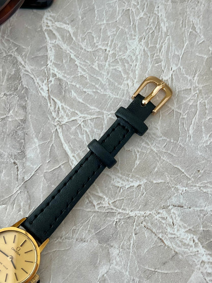 Omega De Ville Gold Tone Round Champagne Dial Women's Watch