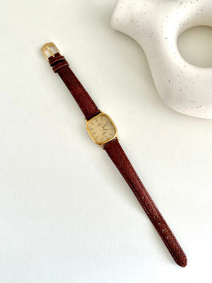 Omega De Ville Gold Women's Watch with Chequered Dial