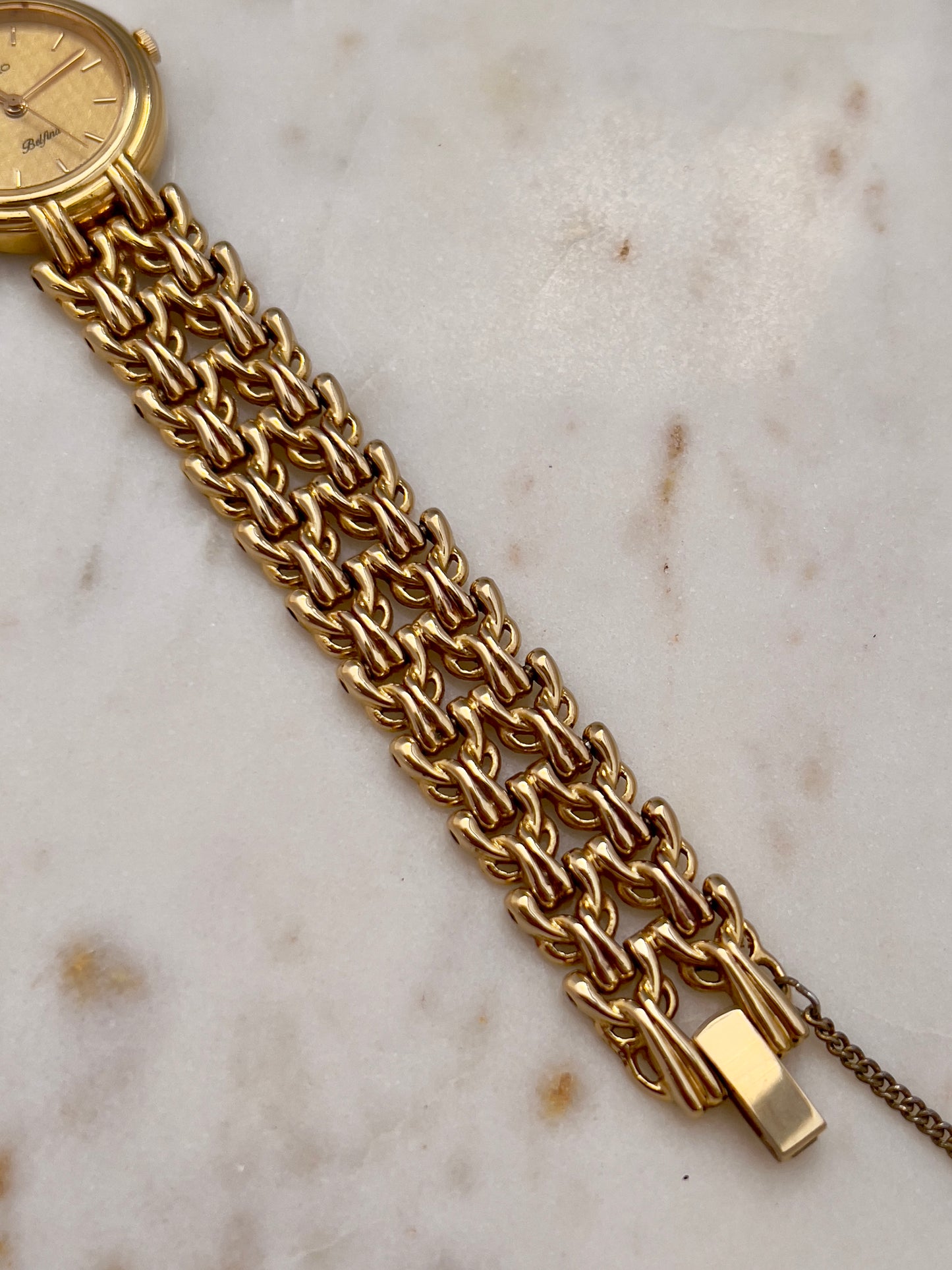 Seiko Belfina Gold Toned Watch with Intricate Bracelet