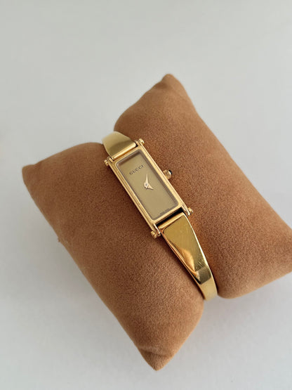 Gucci 1500L Gold Bangle Women’s Watch Champagne Dial