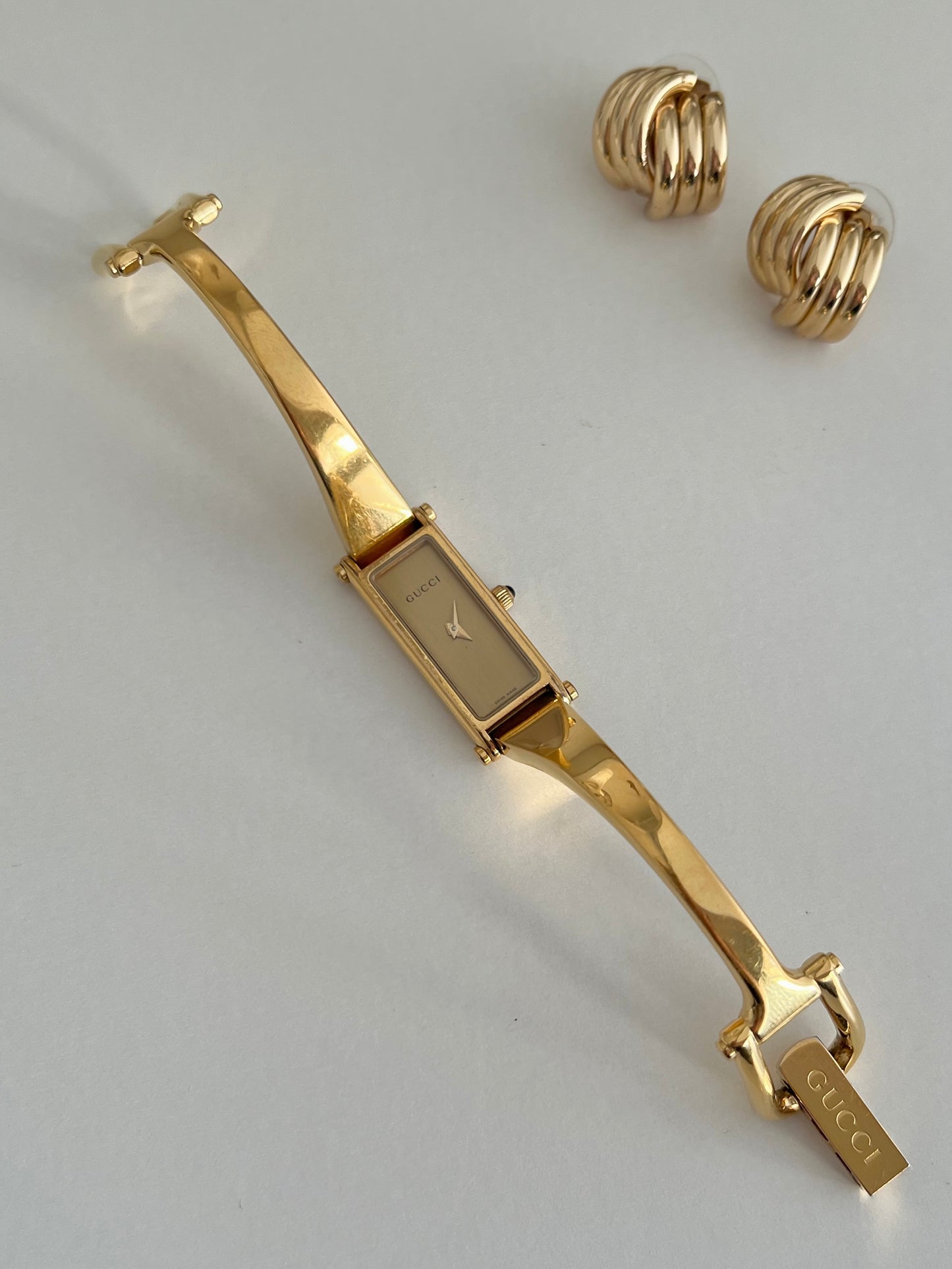 Gucci 1500L Gold Bangle Women’s Watch Champagne Dial