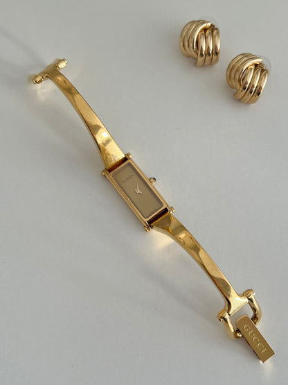 Gucci 1500L Gold Bangle Women’s Watch Champagne Dial