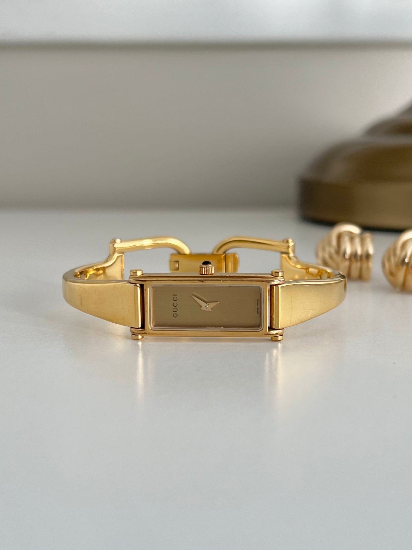Gucci 1500L Gold Bangle Women’s Watch Champagne Dial