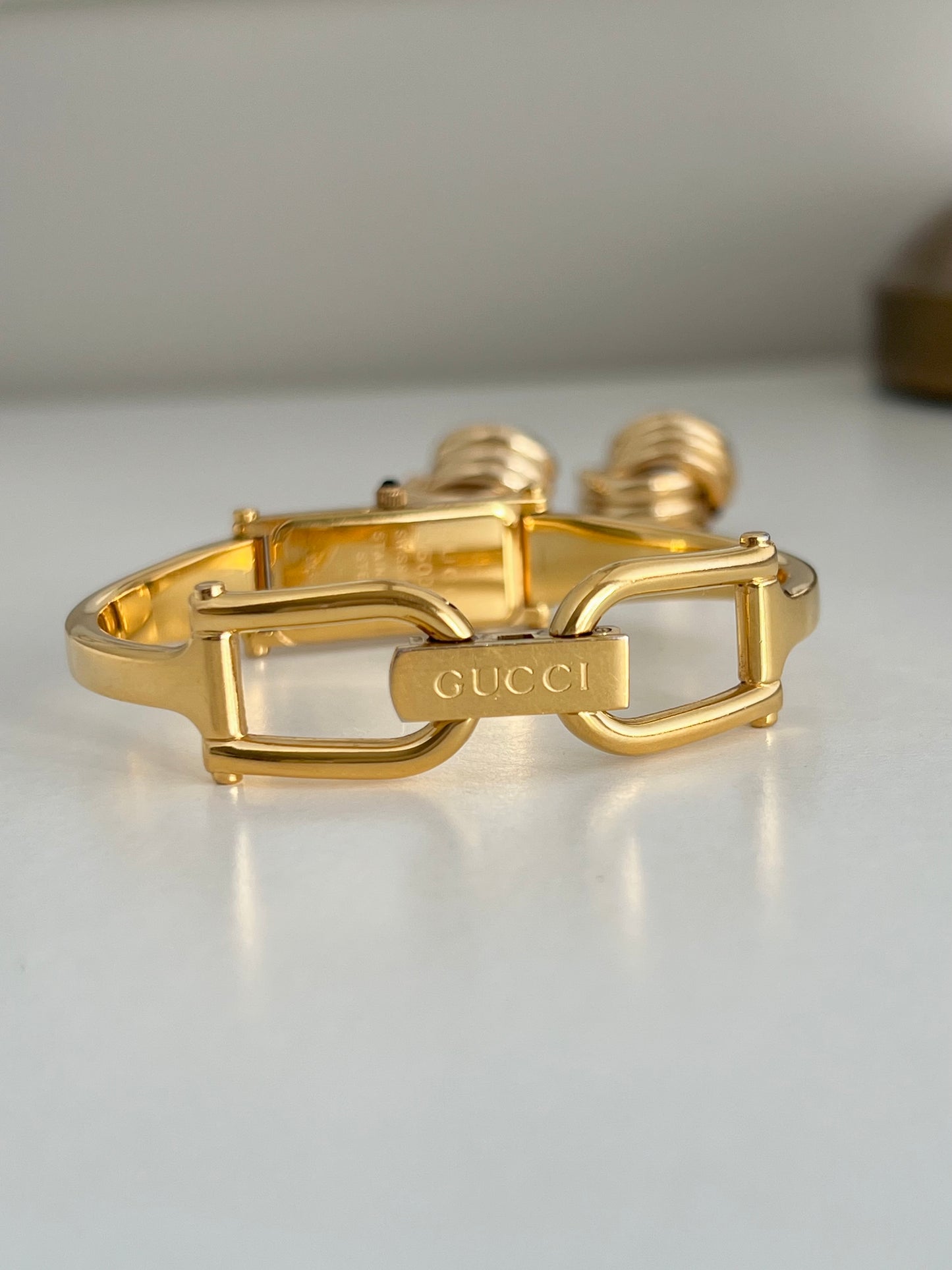 Gucci 1500L Gold Bangle Women’s Watch Champagne Dial