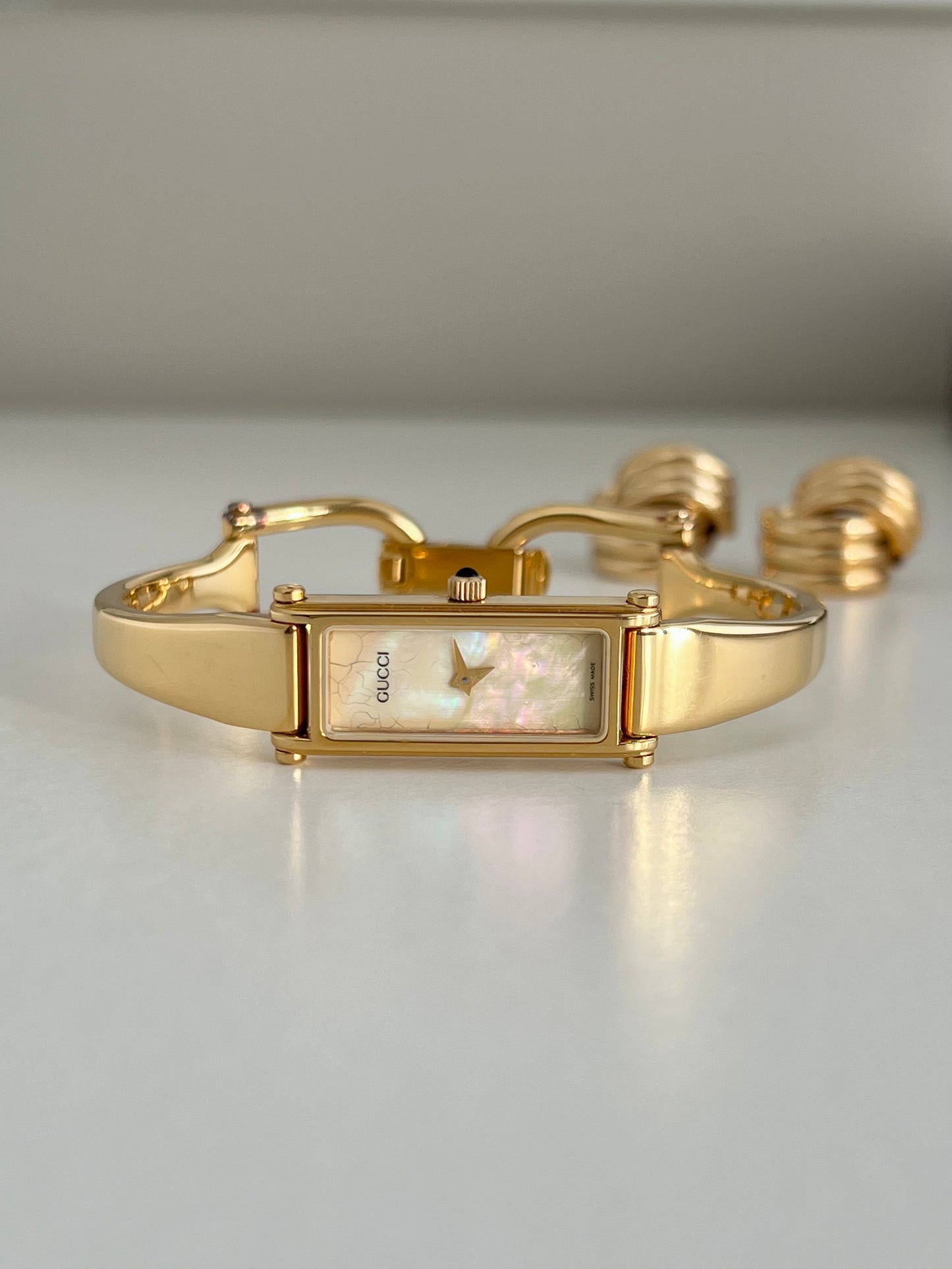 Gucci 1500 Gold Bangle Women’s Watch Mother of Pearl Dial