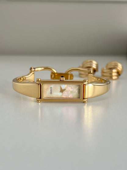 Gucci 1500 Gold Bangle Women’s Watch Mother of Pearl Dial