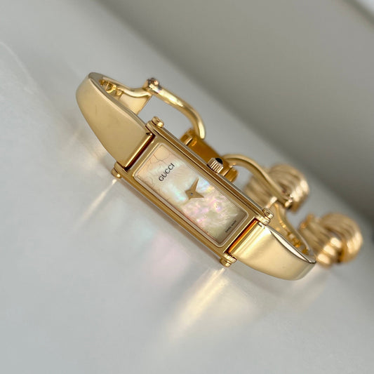 Gucci 1500 Gold Bangle Women’s Watch Mother of Pearl Dial