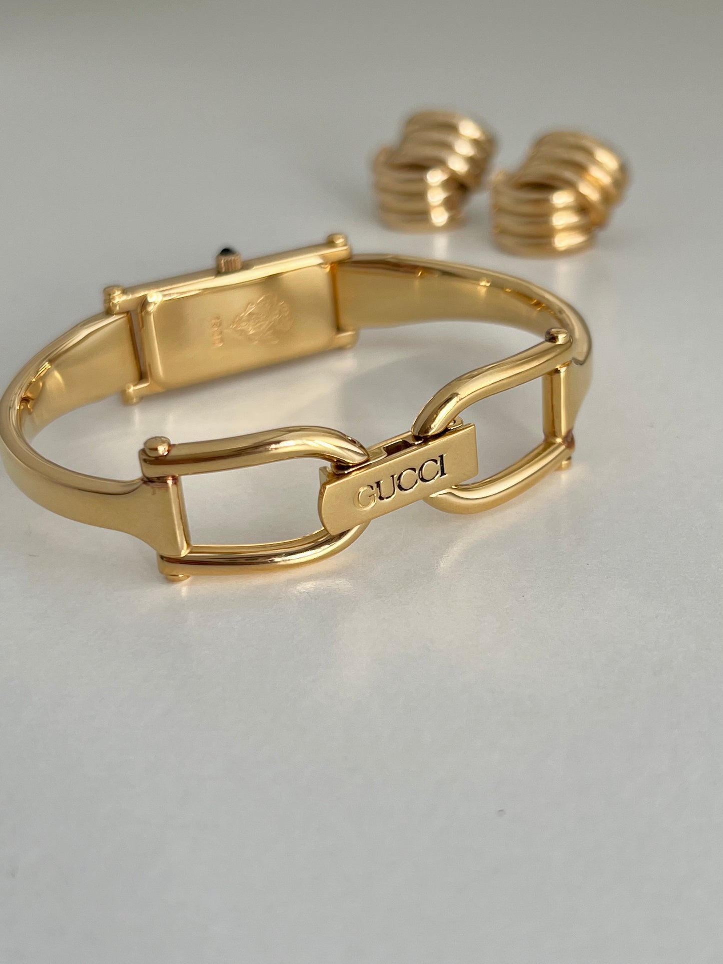 Gucci 1500 Gold Bangle Women’s Watch Mother of Pearl Dial
