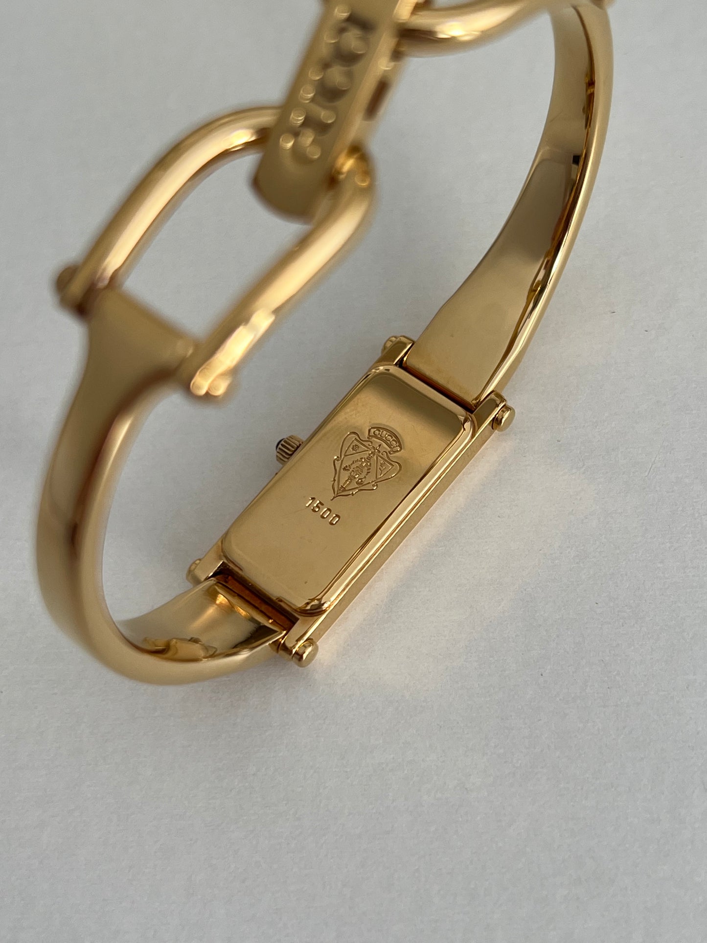 Gucci 1500 Gold Bangle Women’s Watch Mother of Pearl Dial