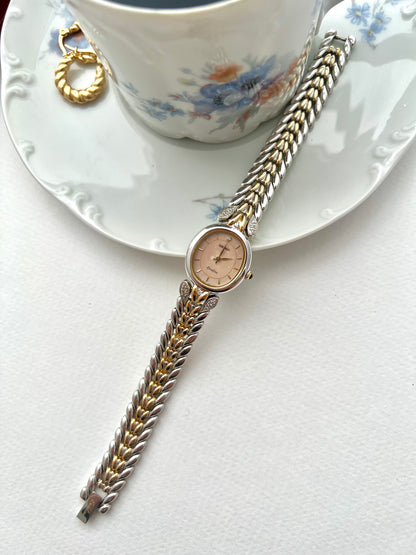 Seiko Exceline Ladies Oval Watch with Stardust Salmon Dial and Diamond Leaf Bracelet