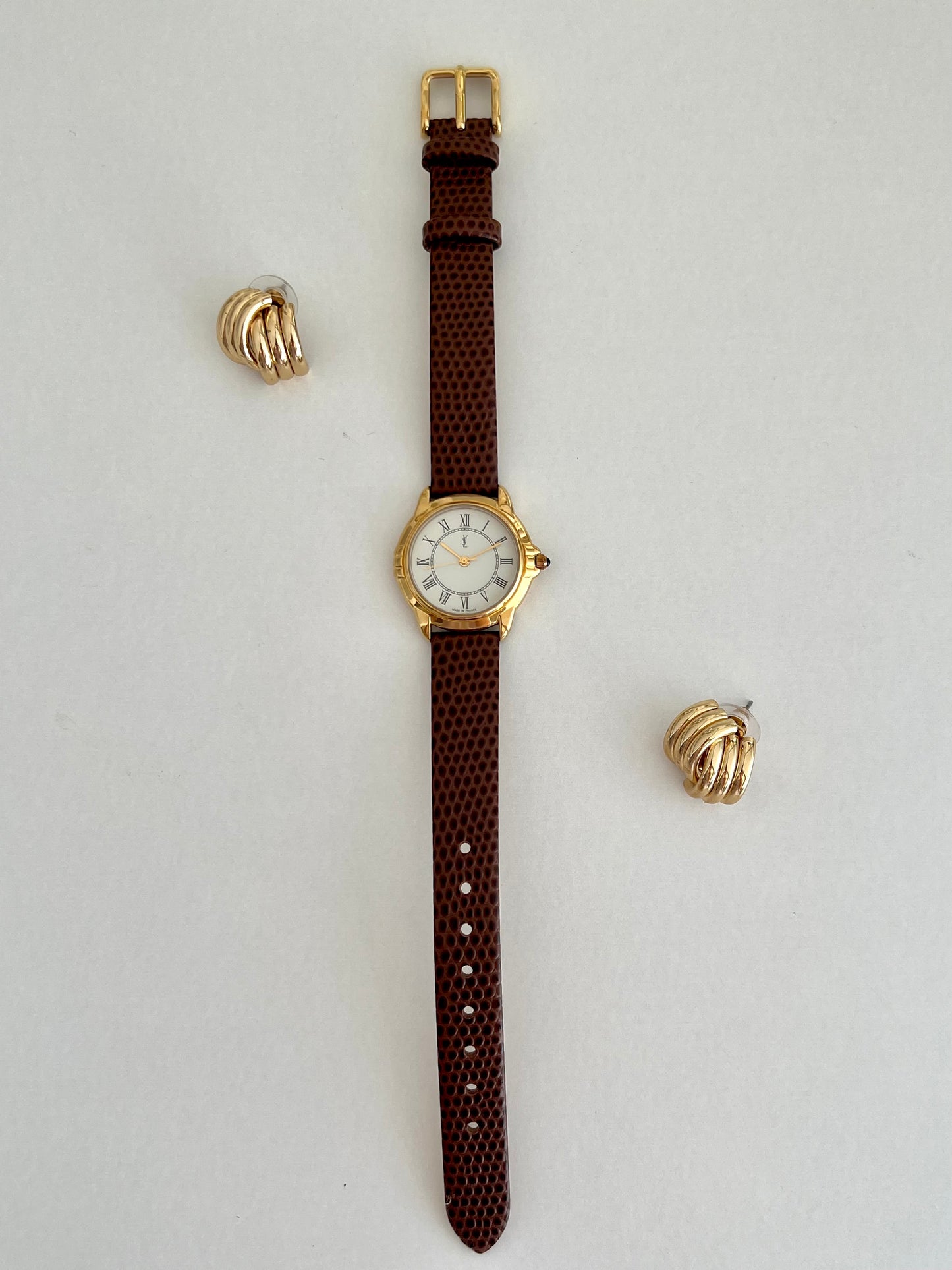 Yves Saint Laurent Roman Numeral Gold Tone Watch