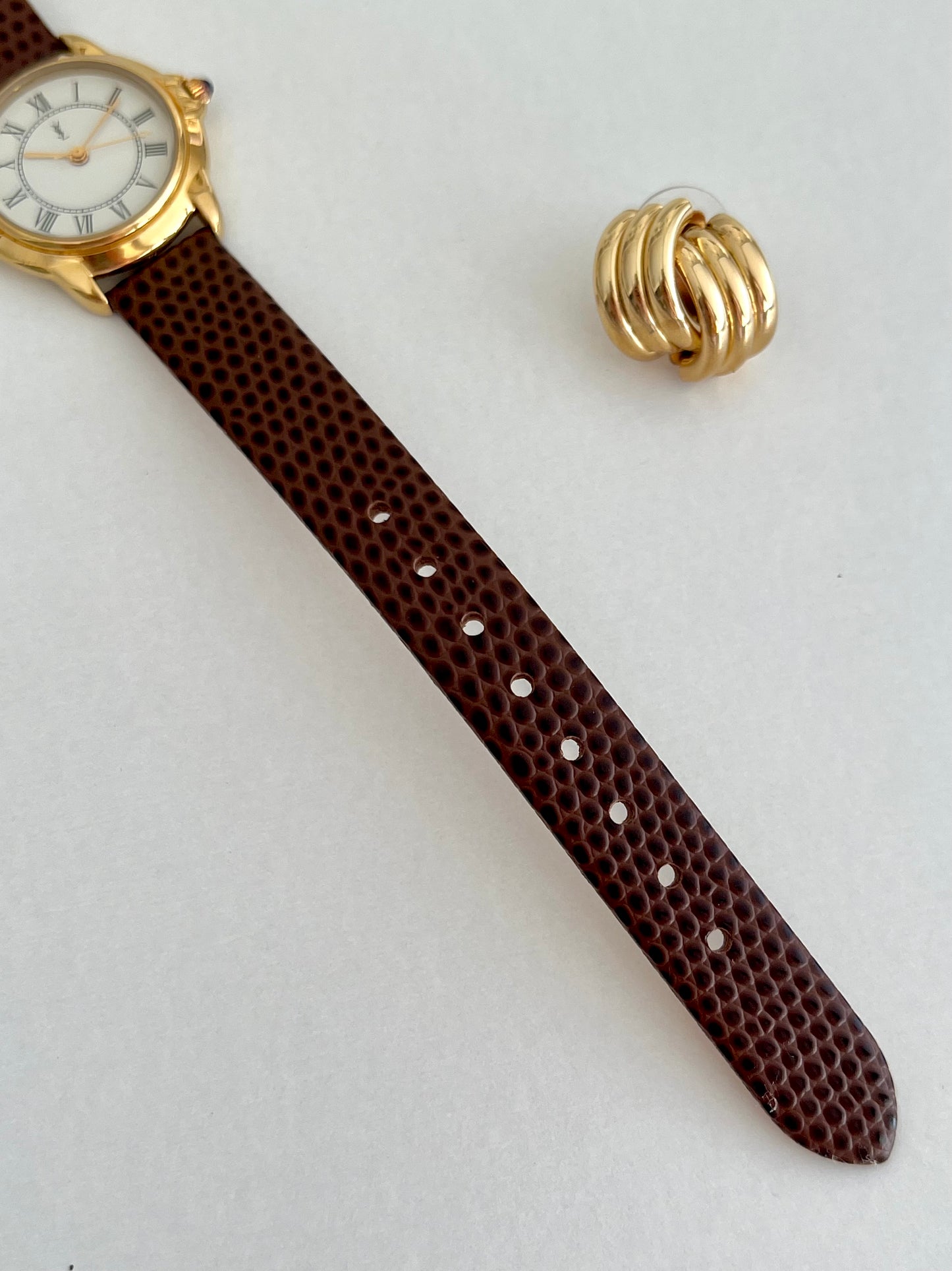 Yves Saint Laurent Roman Numeral Gold Tone Watch